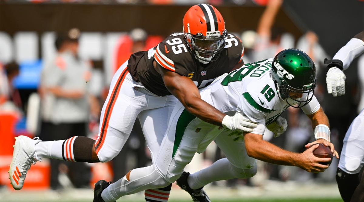Cleveland Browns defensive end Myles Garrett (95) sacks New York Jets quarterback Joe Flacco (19) during the first half of an NFL football game, Sunday, Sept. 18, 2022, in Cleveland.